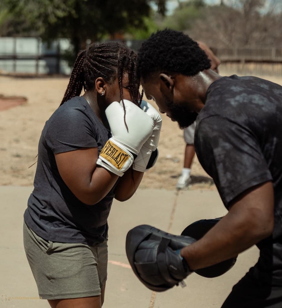 Coach working with a boxer